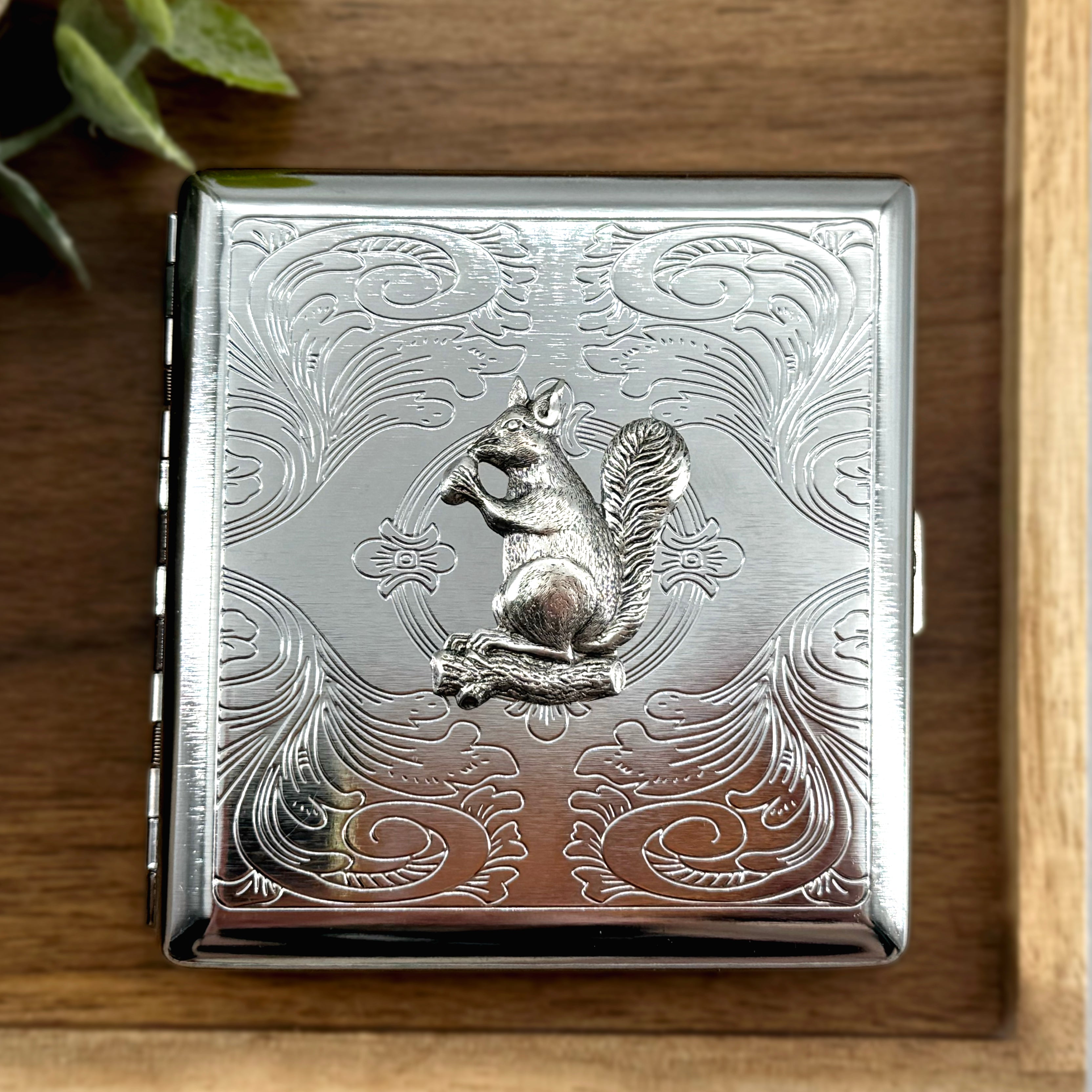Compact silver pocket case for cigarettes, cards, and cash