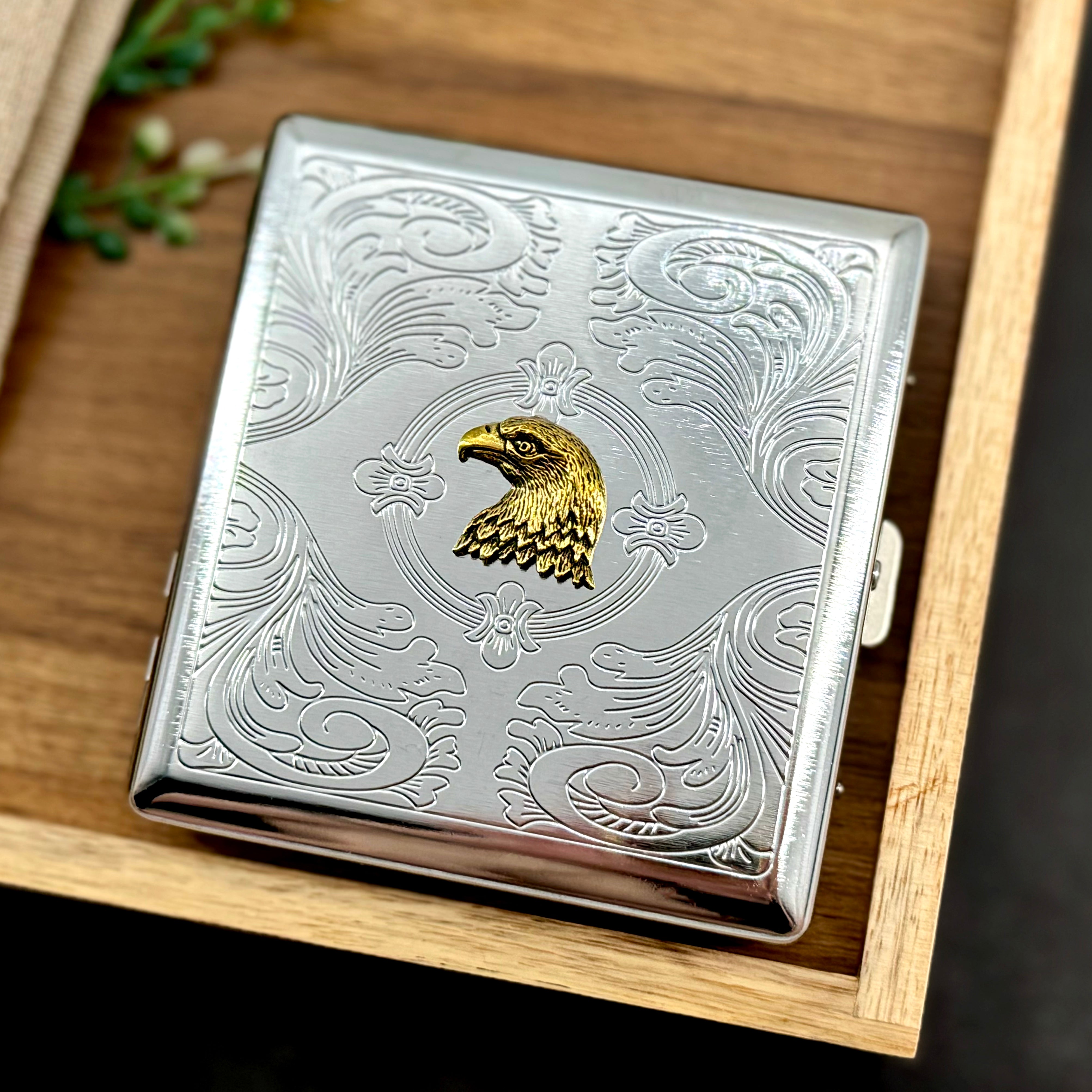 Eagle card holder with ornate engraved silver finish and raised bird detail