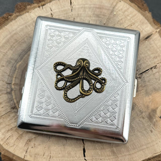 Nautical octopus cigarette case closed front view with polished silver finish