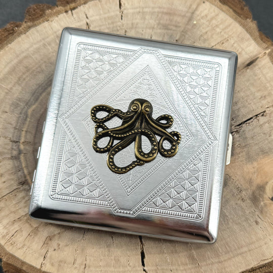 Nautical octopus cigarette case closed front view with polished silver finish