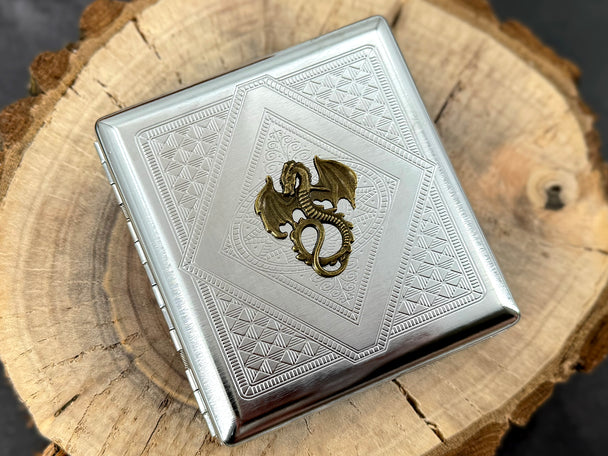 Bronze winged dragon metal cigarette case with detailed stamped geometric background