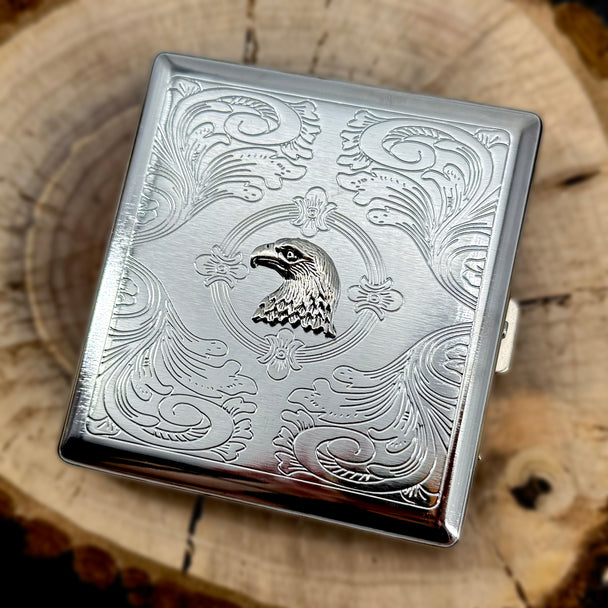 Wildlife-inspired cigarette case with raised eagle accent and decorative engraved background