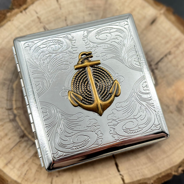 Nautical anchor card holder case on wood surface