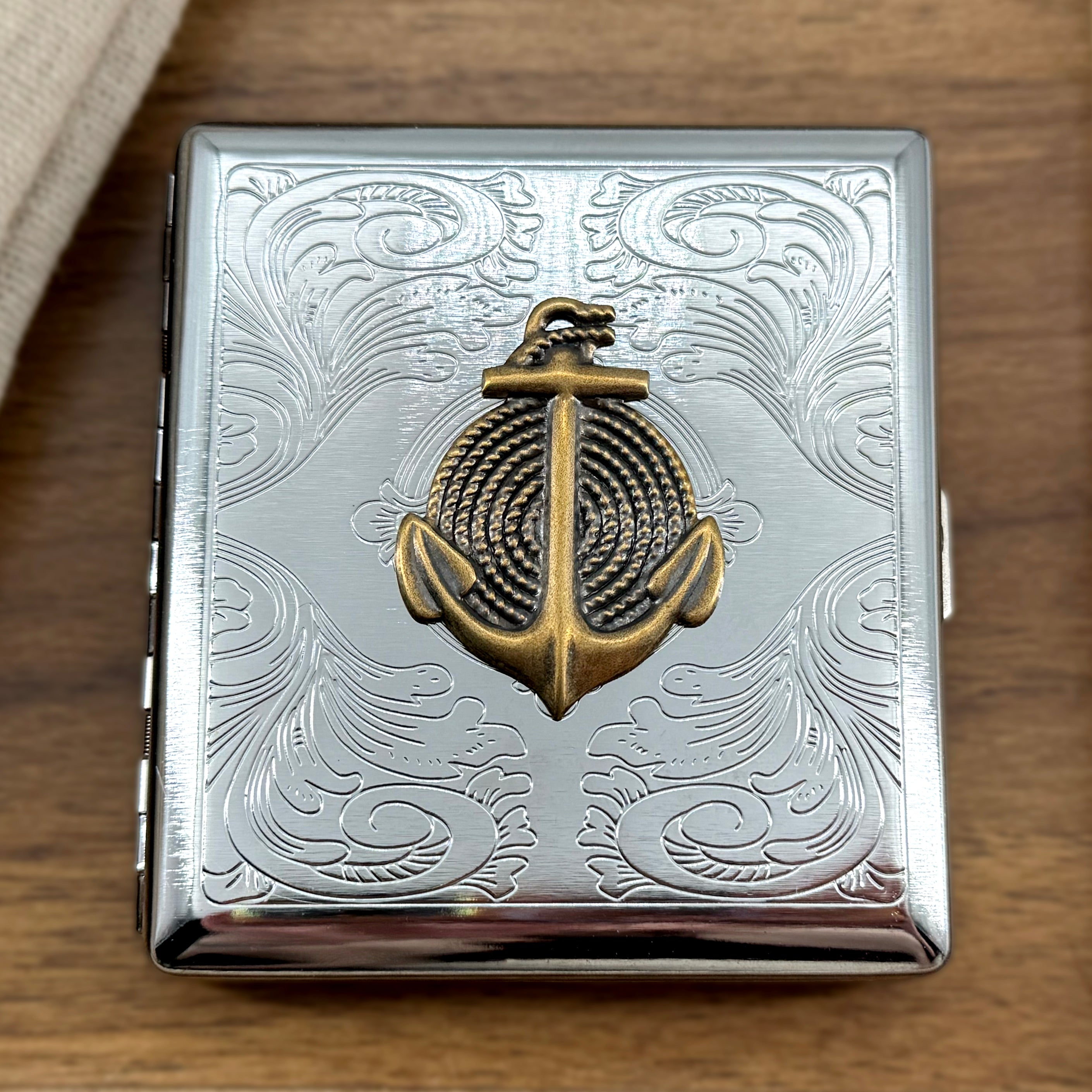 Close-up of maritime pocket case with anchor emblem