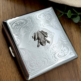 Handmade frog business card holder with a detailed silver amphibian design.