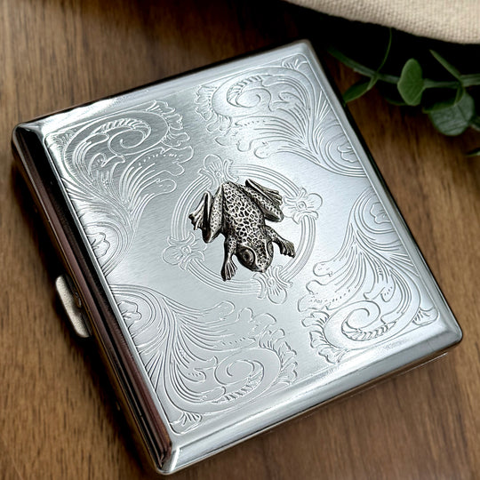 Handmade frog business card holder with a detailed silver amphibian design.