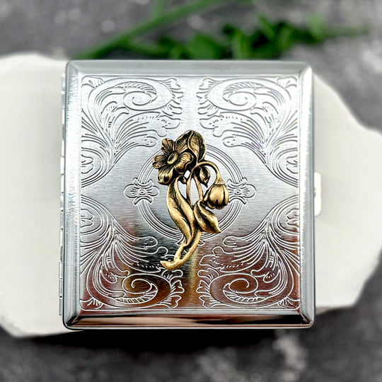 Botanical Grace Case featuring a raised floral design and engraved ornamental background