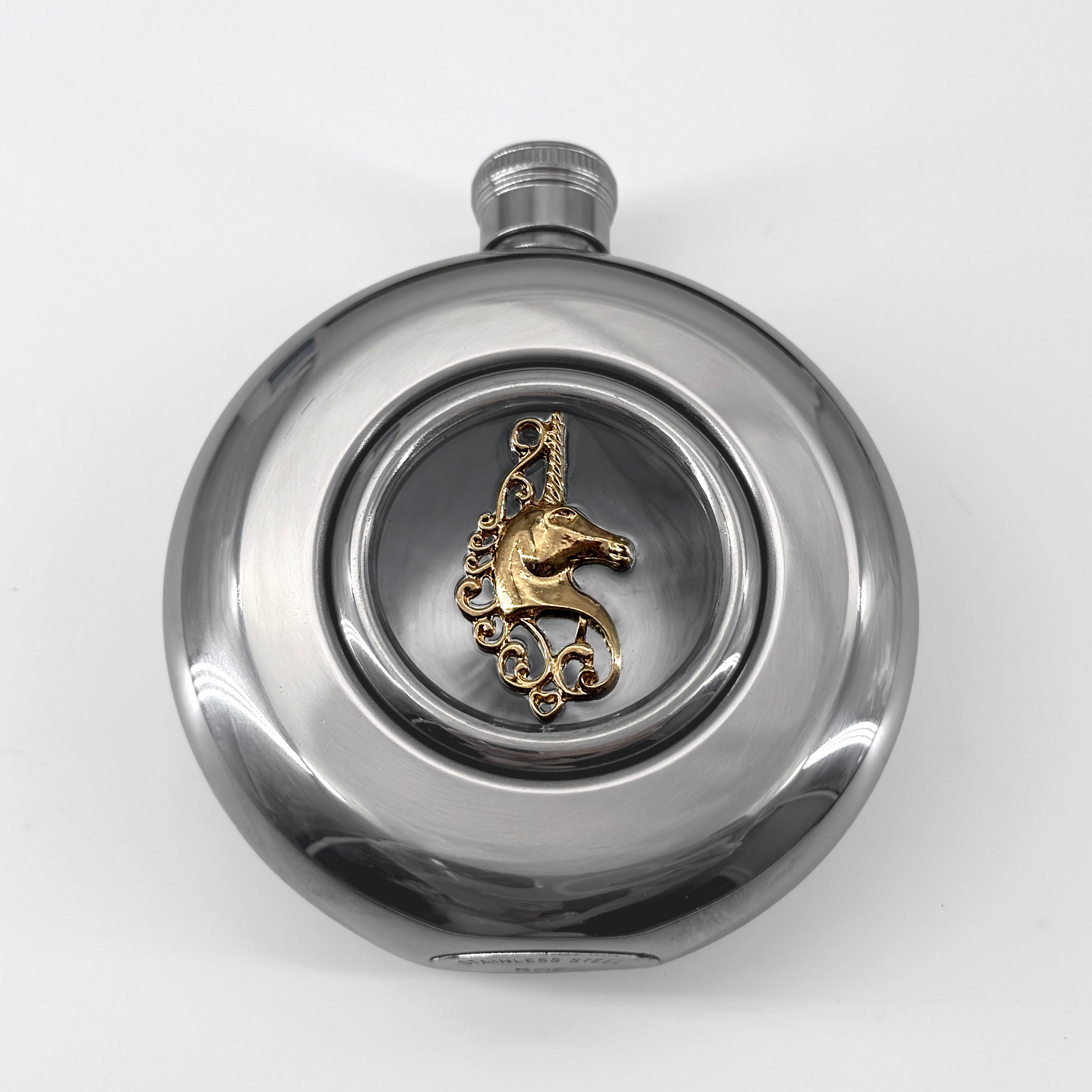 Mirror finish flask with a gold unicorn
