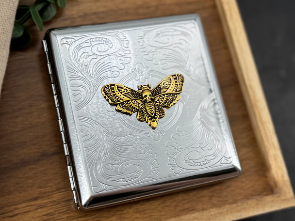 Gold skull moth business card holder featuring a detailed Death's-head hawkmoth on silver metal