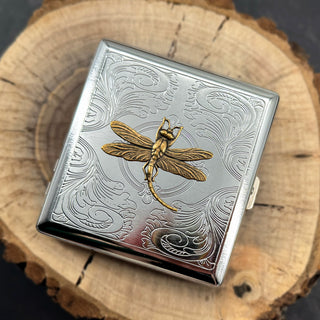 Dragonfly card holder case in stamped silver metal with raised gold insect detail