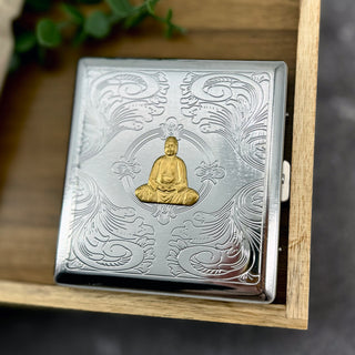 Handmade Golden Buddha cigarette case featuring raised Buddha design with engraved ornamental background