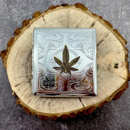 Cannabis card holder with polished metal finish and leaf emblem
