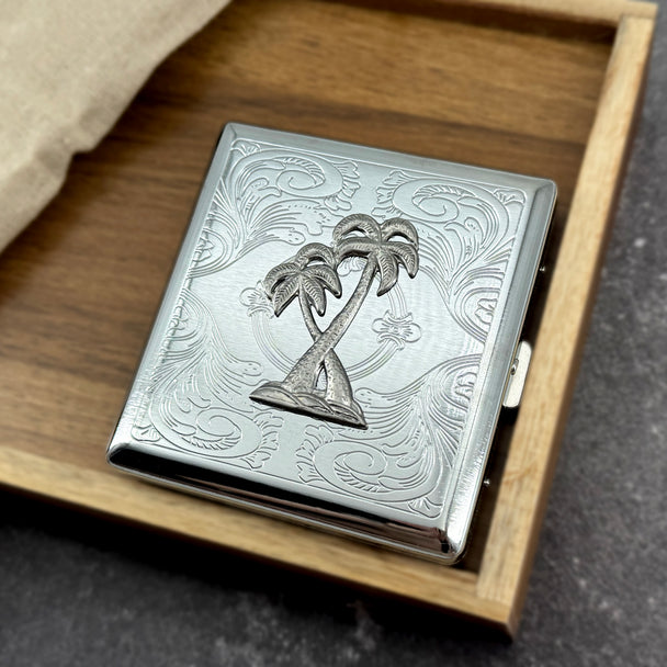 Tropical palm tree card holder with engraved metal finish and secure snap closure