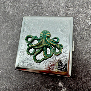Nautical pocket case featuring raised octopus emblem and ornate background