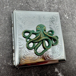 Silver card holder with kraken emblem and decorative stamped pattern
