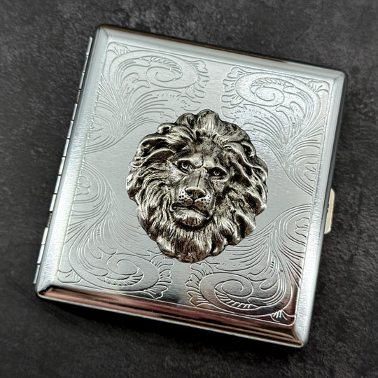 Majestic lion metal card holder featuring detailed raised lion sculpture on silver case