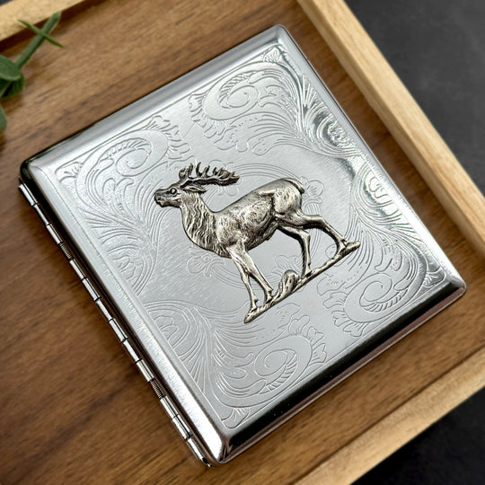 Silver elk metal card holder with detailed wildlife design and secure snap closure
