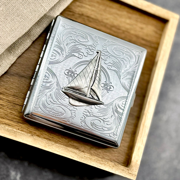 Handmade sailboat business card holder in polished silver finish