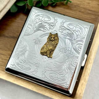 Metal card holder featuring antique-style Persian cat centerpiece