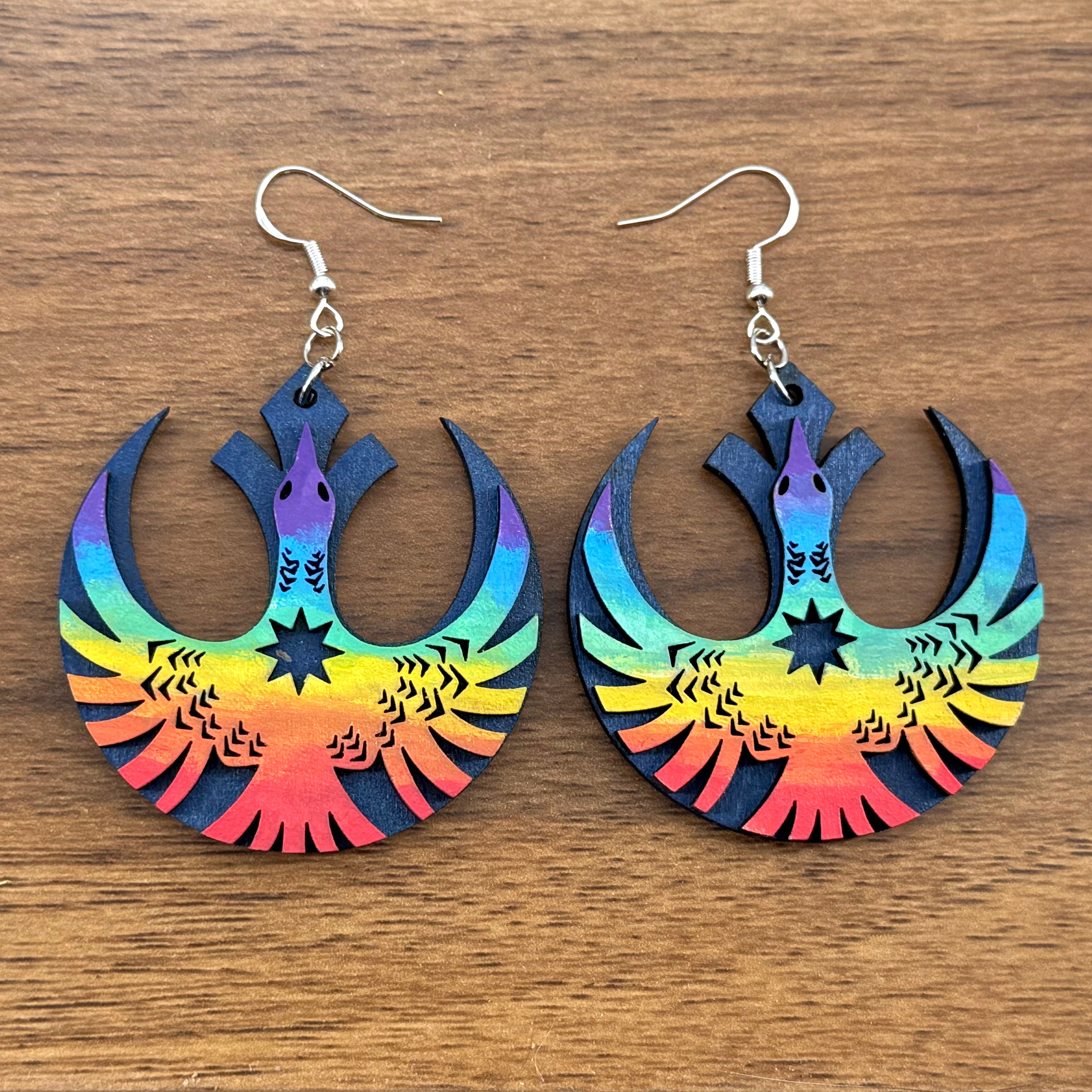 Lightweight LGBTQ pride statement earrings inspired by Minnesota loon art