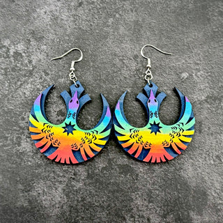 Rainbow rebel loon wooden earrings on gray stone background