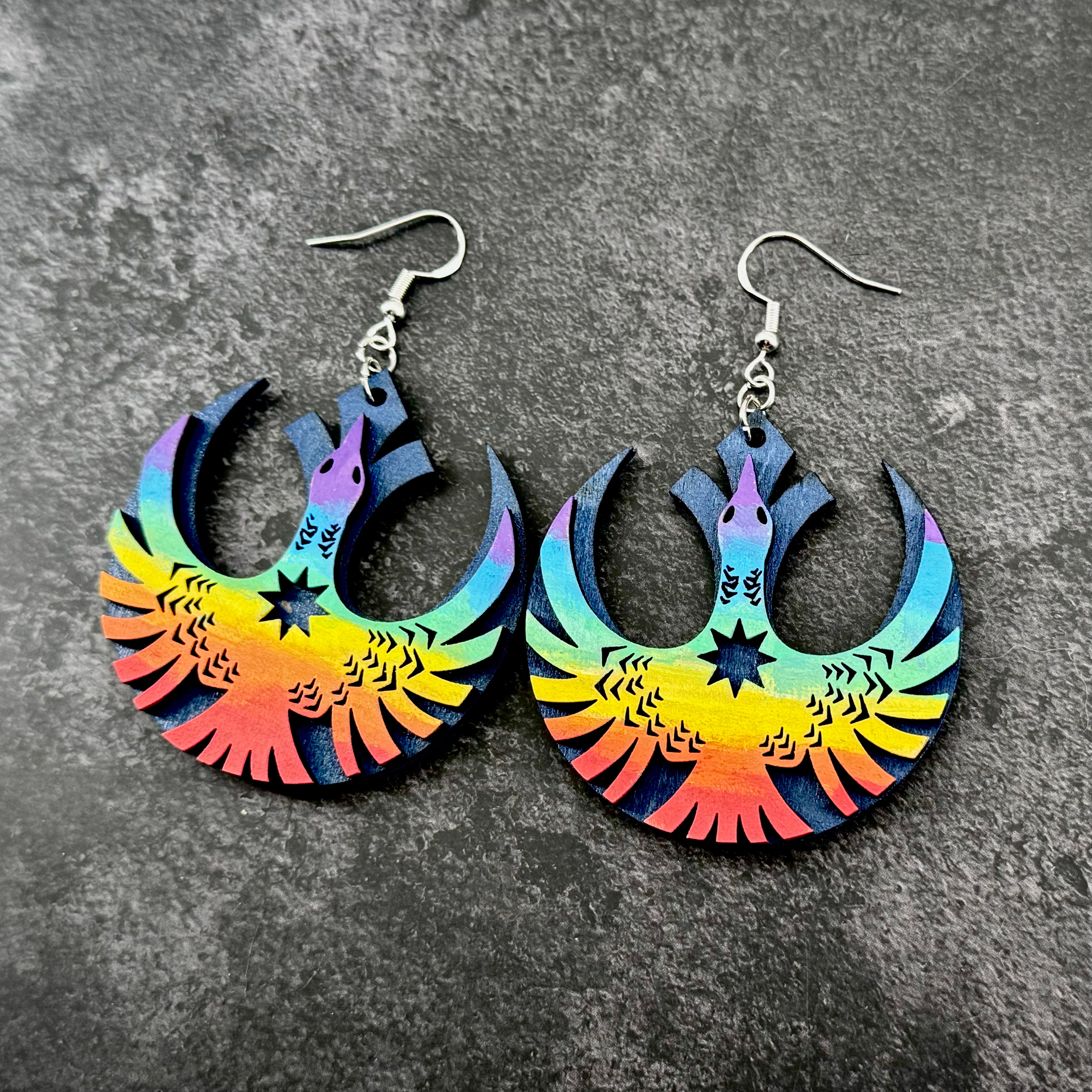 Handmade Minnesota Strong pride earrings with colorful rebel loon design