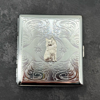 Handmade cat cigarette case with raised feline charm on silver stamped metal case