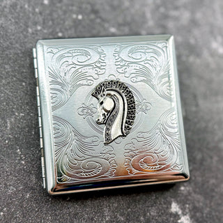 Noble Steed Case featuring a raised horse design and engraved ornamental background