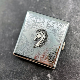 Horse pocket case with detailed equestrian motif and engraved silver finish