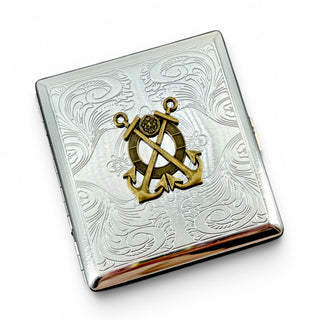Nautical cigarette case with anchor and ship wheel design
