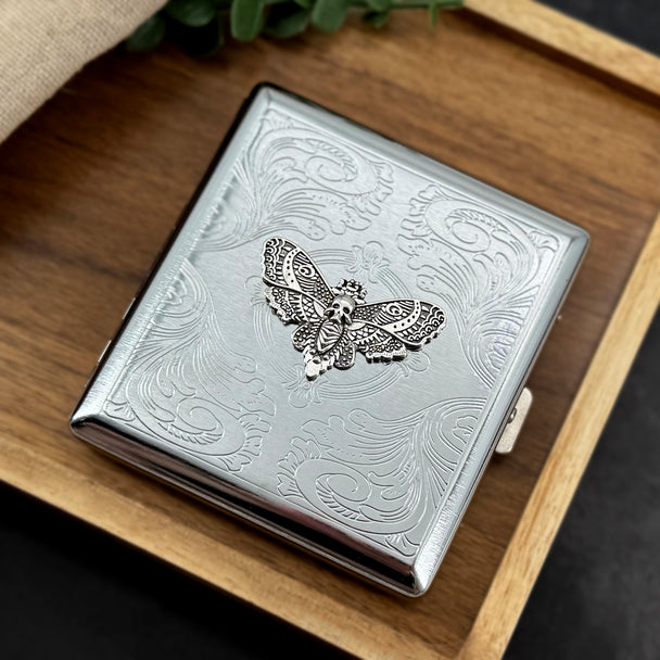 Silver skull moth business card holder featuring a detailed Death's-head hawkmoth on polished metal