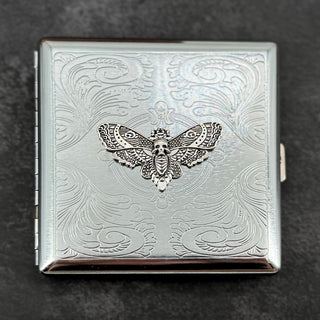 Silver option gothic metal card case with raised silver Death's-head hawkmoth and decorative stamped scrollwork