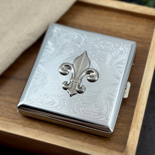 Fleur-de-lis card holder with antique-finished metal accent