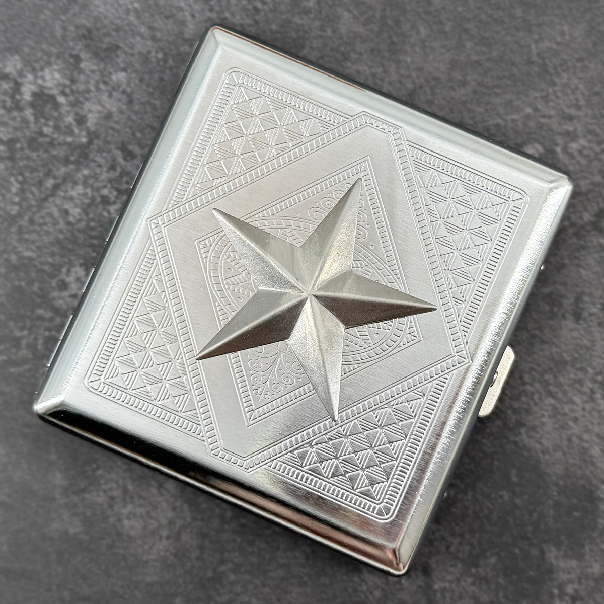 Sailor inspired silver card holder with dimensional nautical star design