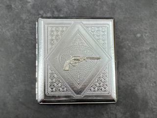 Front view of Western cigarette case with stamped geometric diamond pattern.