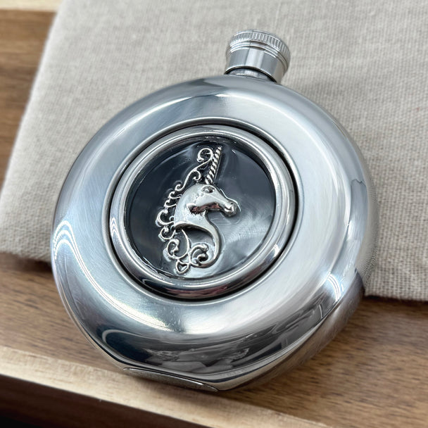 Mirror-finish 5 oz hip flask featuring a silver unicorn with decorative scrollwork