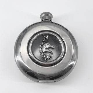 Close-up of raised unicorn detail centered in the transparent flask window