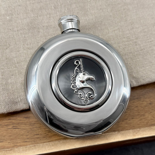 Fantasy-inspired stainless steel flask with silver unicorn centerpiece