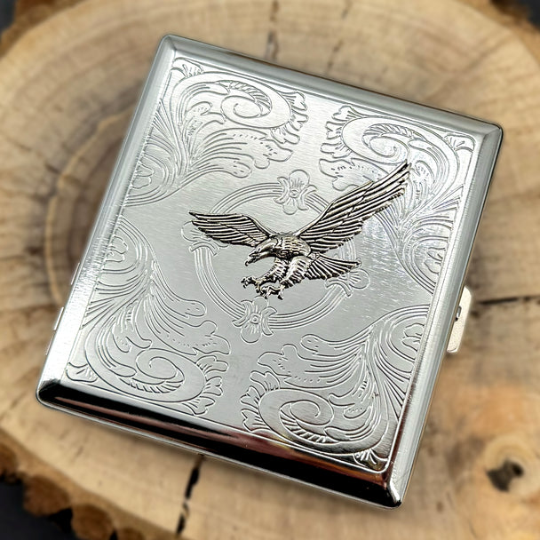 Compact silver case with detailed eagle centerpiece