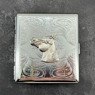 Equestrian cigarette case angled view with horse head detail