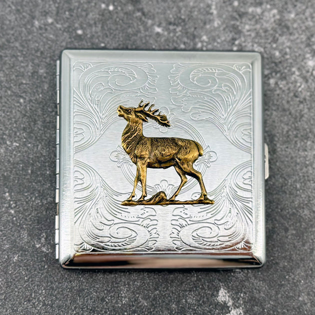 Stag pocket case with raised deer design and engraved ornamental background