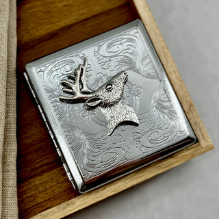 Woodland-inspired cigarette case with raised antlered deer