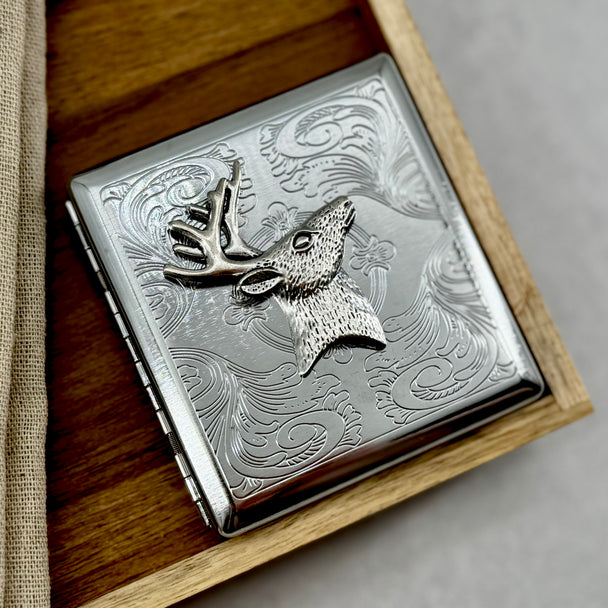 Woodland-inspired cigarette case with raised antlered deer