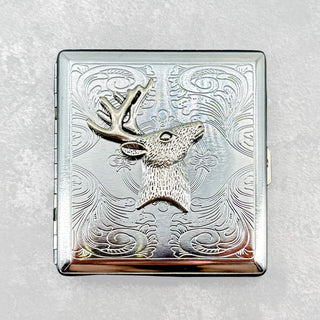 Metal pocket case featuring detailed buck head design