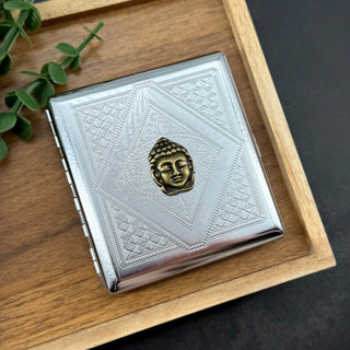 Zen-inspired Buddha cigarette case closed front view with polished silver finish