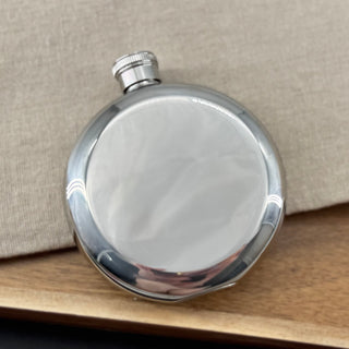 The back of the mirror finished longhorn flask