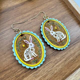 Vintage-style rabbit cameo earrings with engraved wood details