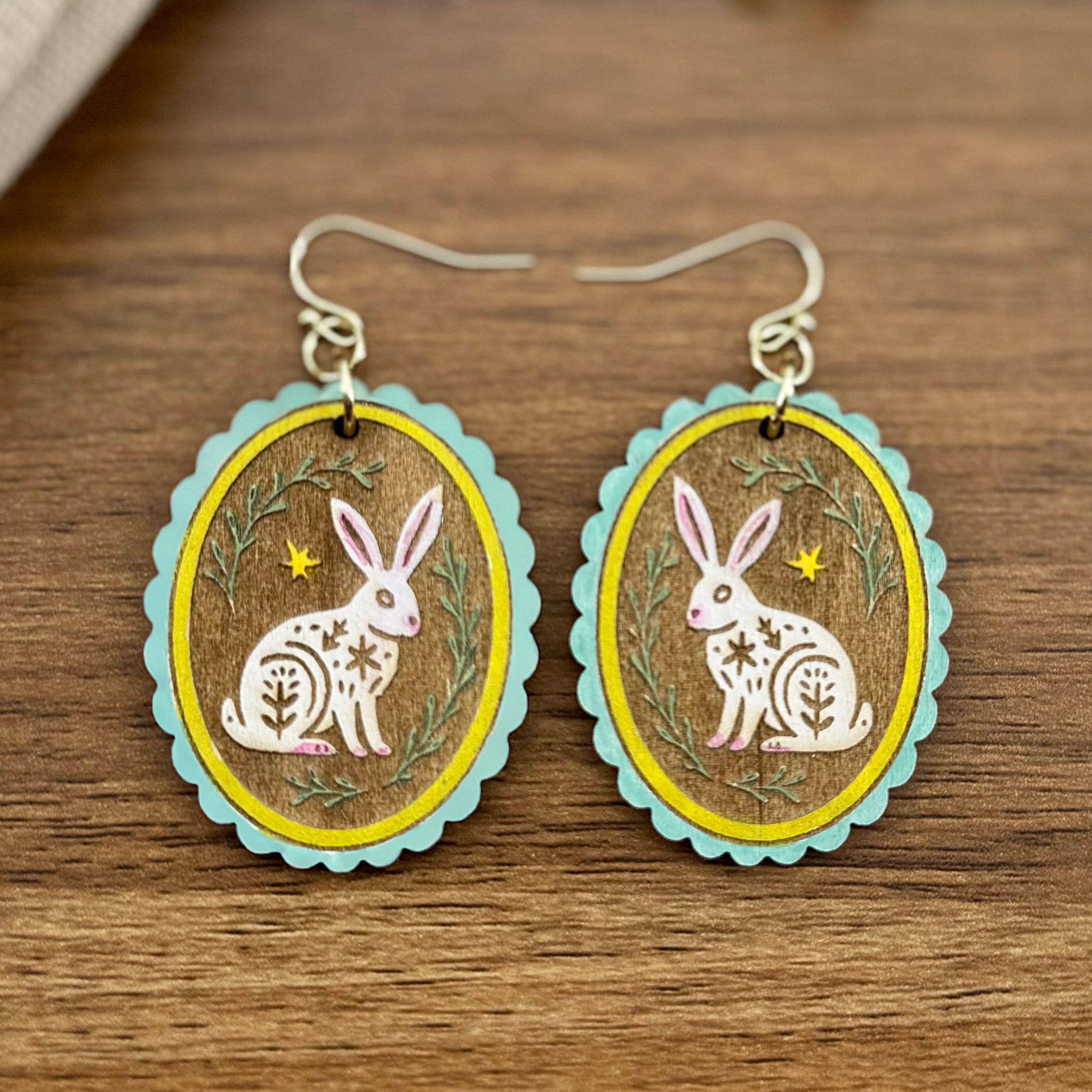 Whimsical bunny earrings with vintage-inspired woodland artwork